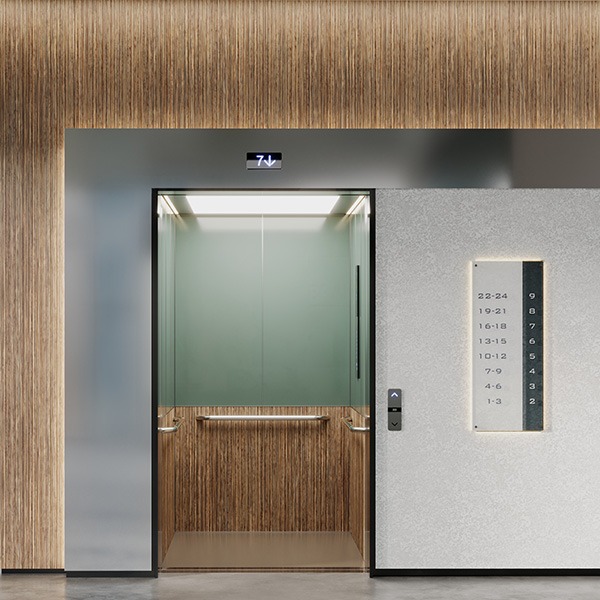Textuur en natuurlijke kleuren worden de onverwachte keuze voor het interieur van een lift 