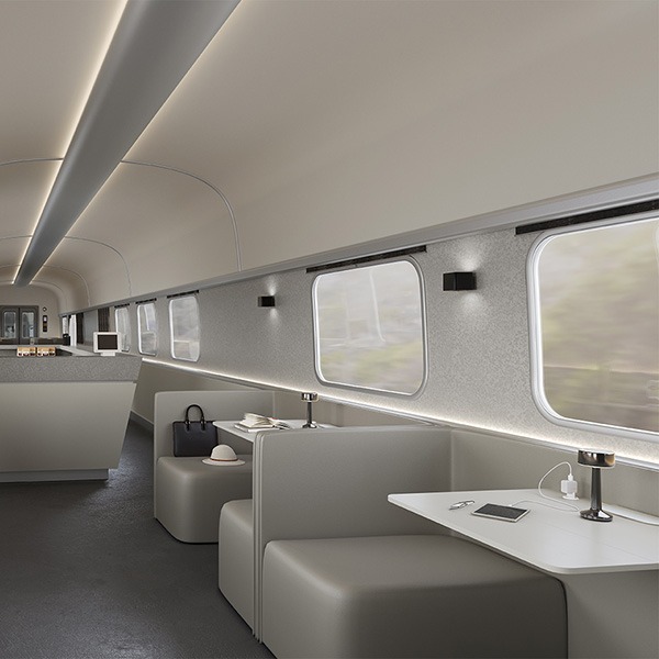 Des surfaces qui évoquent la pierre pour un voyage en train confortable